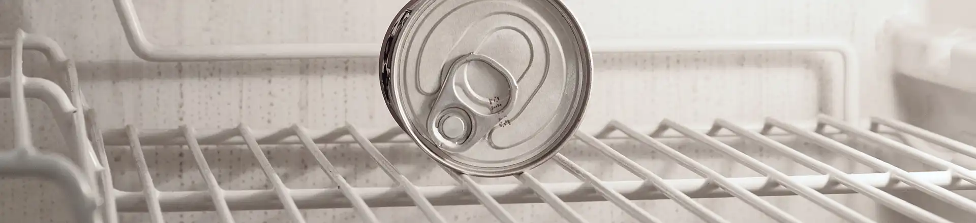 A can inside of a bar fridge