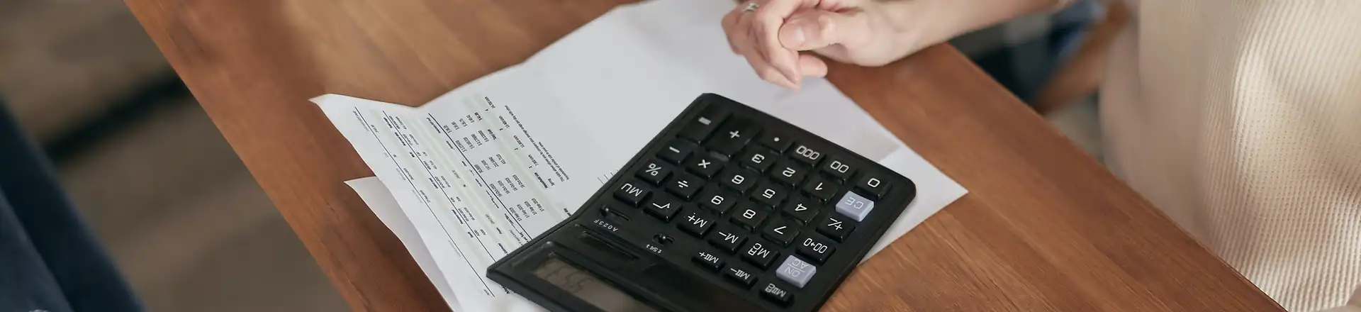 calculator sitting on top of bill