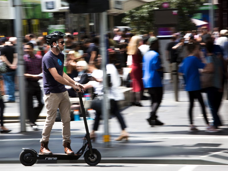 man on escooter