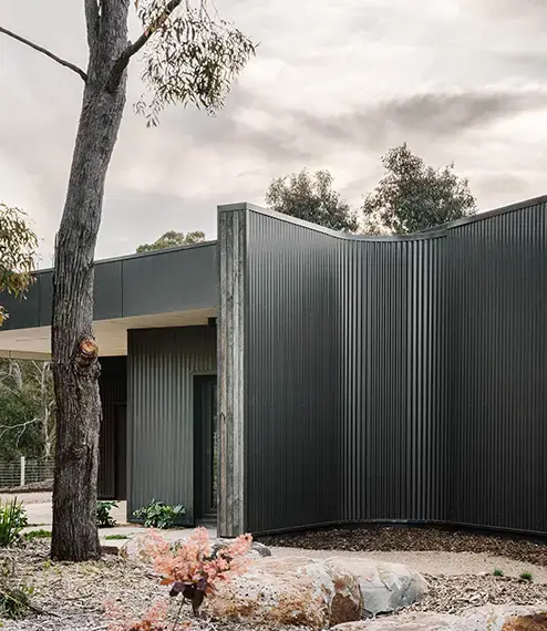 Colourbond and spotted gum cladding on house