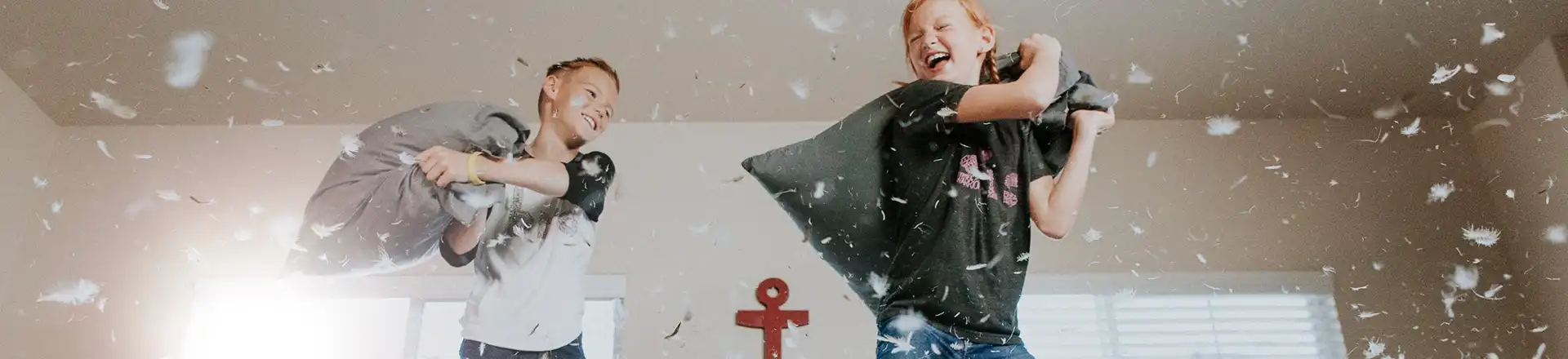 Kids having a pillow fight